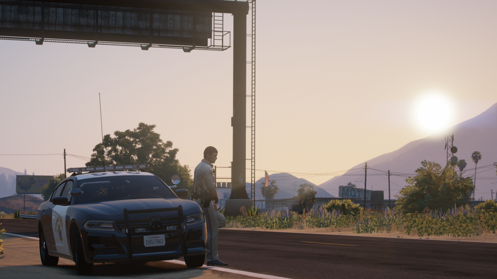 Could contain: outdoor, sky, land vehicle, vehicle, wheel, automotive design, road, luxury vehicle, tire, car, mountain, stop, light