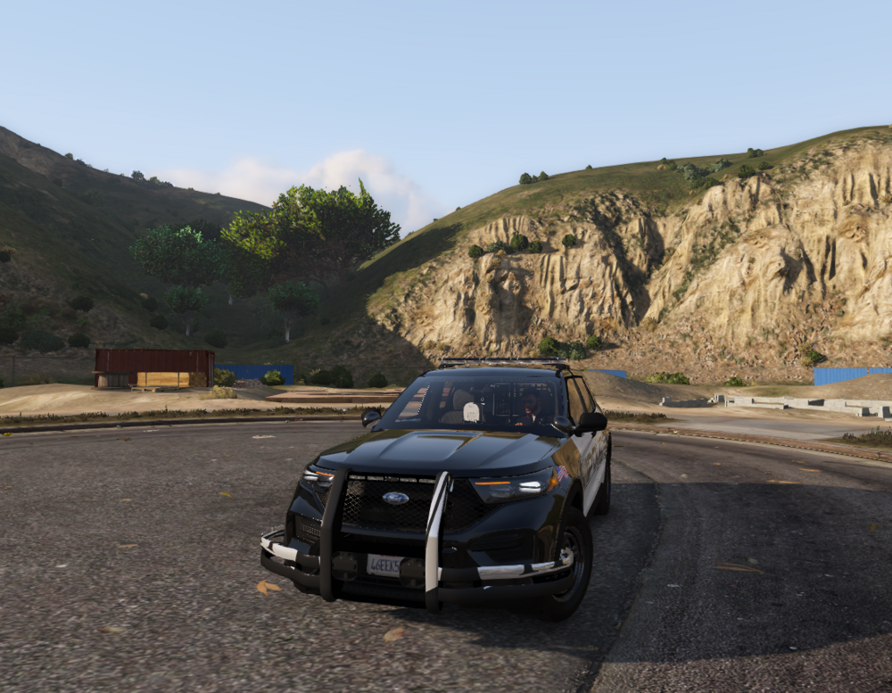 Could contain: outdoor, vehicle, land vehicle, wheel, sky, automotive design, luxury vehicle, ground, road, tire, bumper, sports car, car, mountain, rally