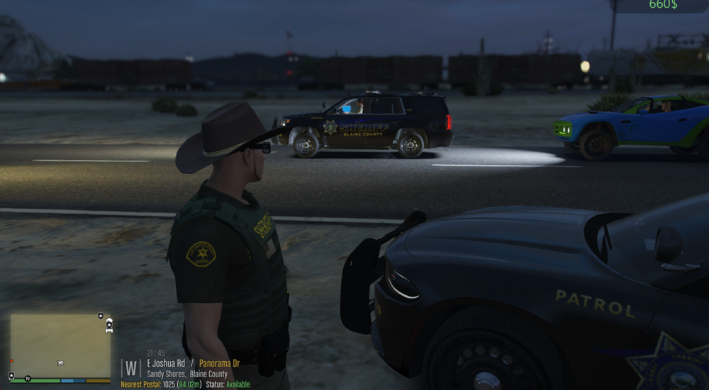 Could contain: vehicle, land vehicle, wheel, tire, clothing, outdoor, pc game, text, person, screenshot, video game software, car