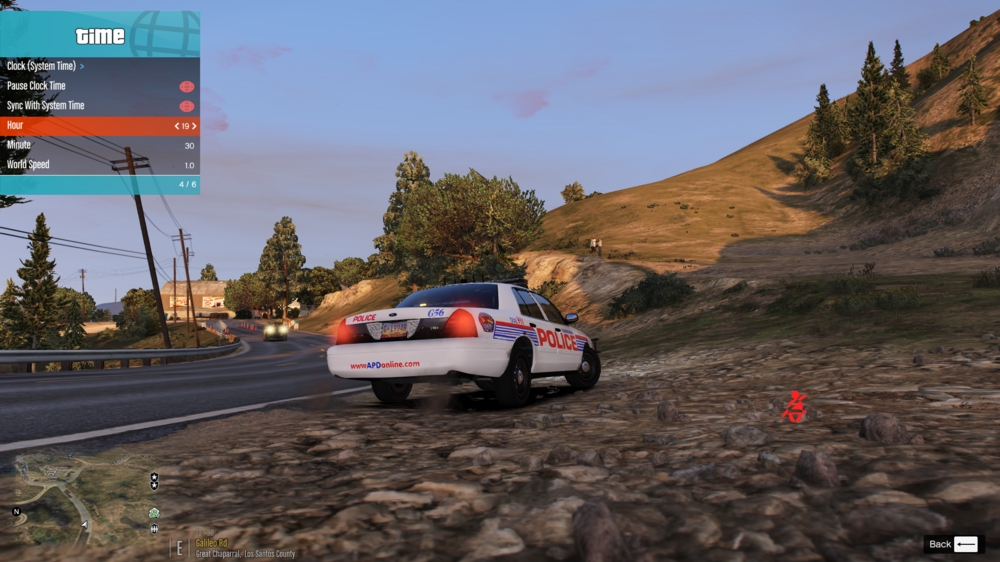 Could contain: text, vehicle, land vehicle, outdoor, sky, motorsport, wheel, screenshot, racing, tire, road, car, race car, mountain, ground