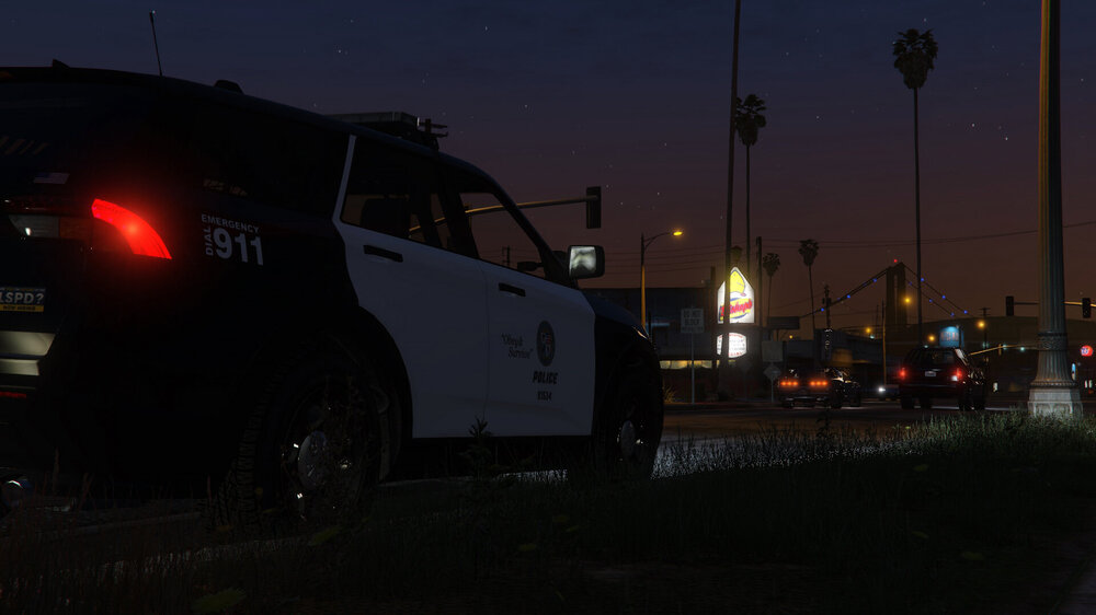 Could contain: outdoor, land vehicle, vehicle, sky, wheel, transport, tire, automotive lighting, light, auto part, night, street light, automotive tail & brake light, road, street, dark, parked, car, stopped