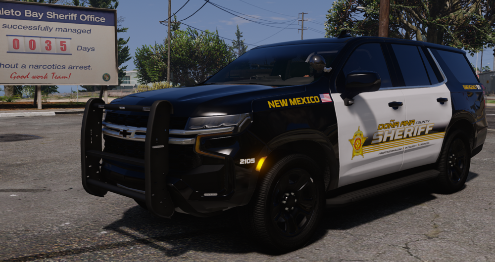 Could contain: land vehicle, vehicle, text, tire, wheel, outdoor, auto part, bumper, police, sport utility vehicle, automotive exterior, motor vehicle, pickup truck, fender, transport, vehicle registration plate, compact sport utility vehicle, road, automotive tire, chevrolet, law enforcement, ford, car, parked, street, truck, suv