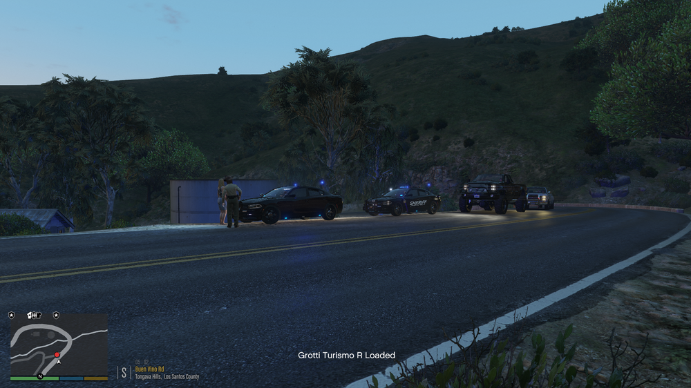 Could contain: outdoor, road, tree, sky, vehicle, land vehicle, road surface, asphalt, thoroughfare, highway, tar, freeway, way, mountain, street