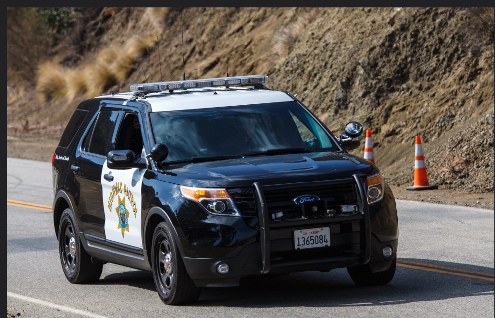 Could contain: vehicle, land vehicle, wheel, tire, outdoor, bumper, sport utility vehicle, car, compact sport utility vehicle, ford, auto part, crossover suv, transport, roof rack, mitsubishi, range rover, automotive luggage rack, land rover, subaru, automotive exterior, nissan, road, police