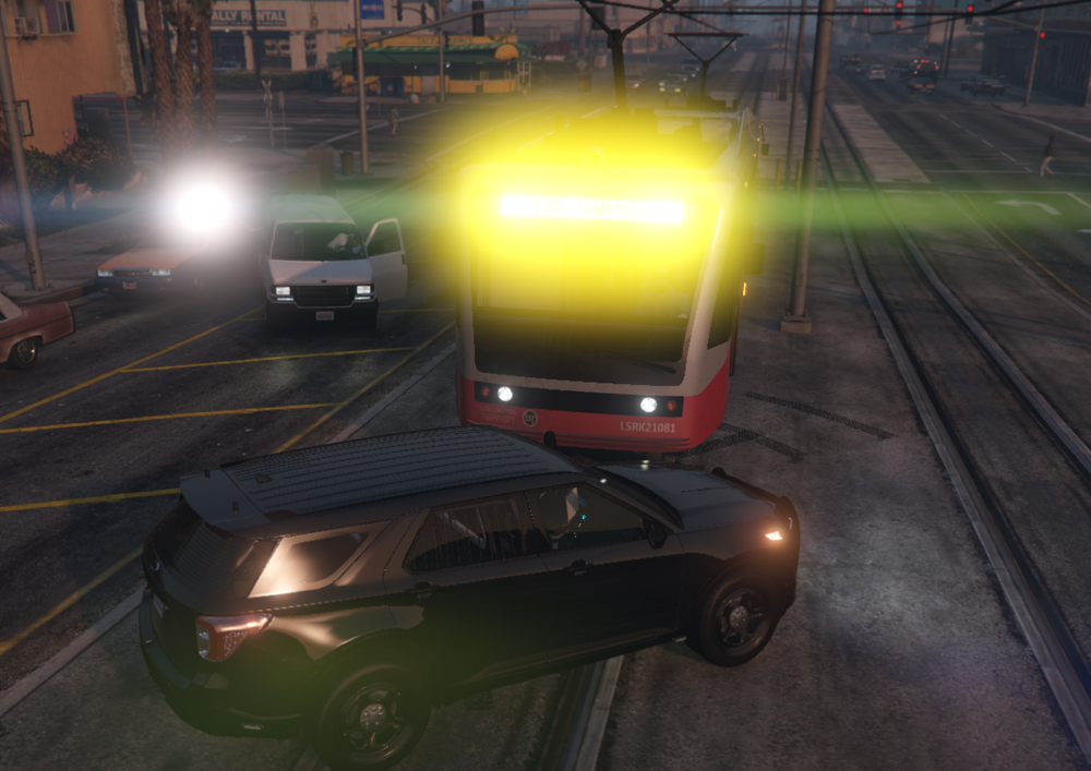 Could contain: vehicle, land vehicle, outdoor, wheel, road, transport, mode of transport, light, street, green, car, ground, yellow