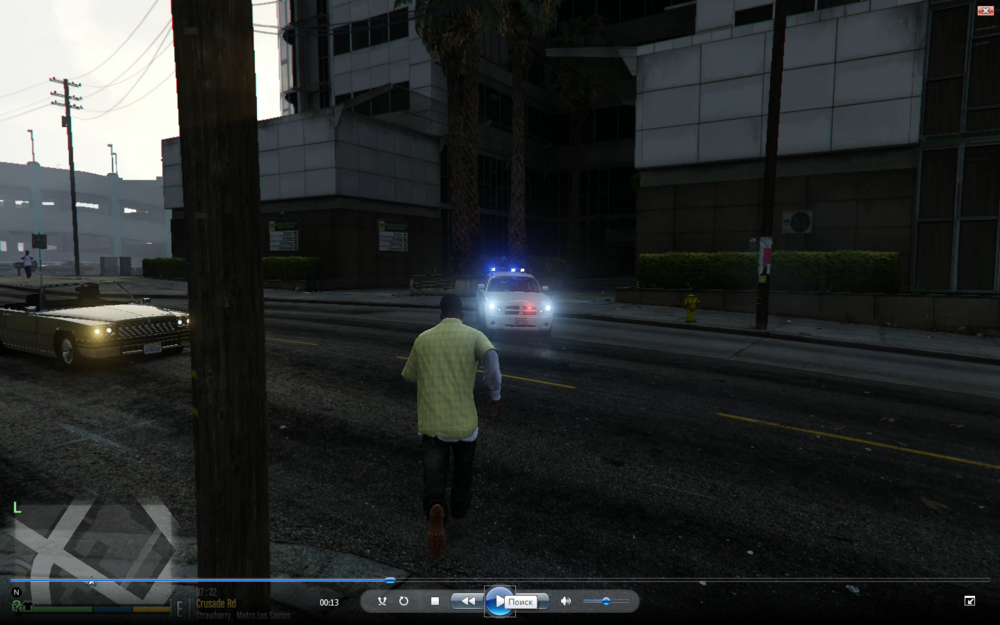 Could contain: outdoor, sky, screenshot, clothing, person, land vehicle, electricity, vehicle, street, street light, road, light