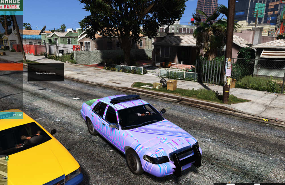 Could contain: vehicle, outdoor, land vehicle, wheel, car, text, transport, road, motorsport, taxi, ground, blue, street