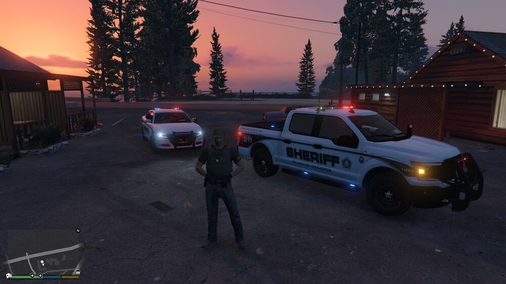 Could contain: vehicle, land vehicle, outdoor, wheel, tire, sky, transport, tree, truck, road, car, police