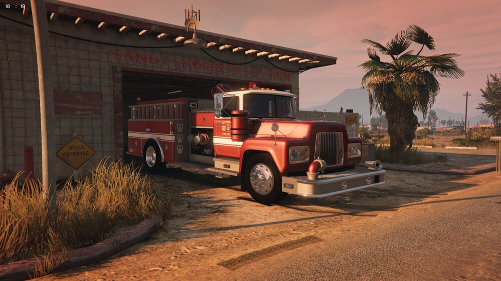 Could contain: outdoor, sky, vehicle, wheel, land vehicle, transport, tree, tire, truck, firefighter, fire, auto part, plant, ground, road, red, parked