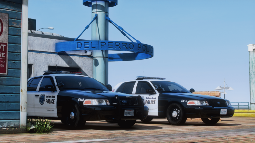 Could contain: vehicle, outdoor, land vehicle, sky, wheel, tire, text, transport, law enforcement, auto part, building, car, vehicle registration plate, police car, automotive exterior, police, ford crown victoria police interceptor, parked, blue, street