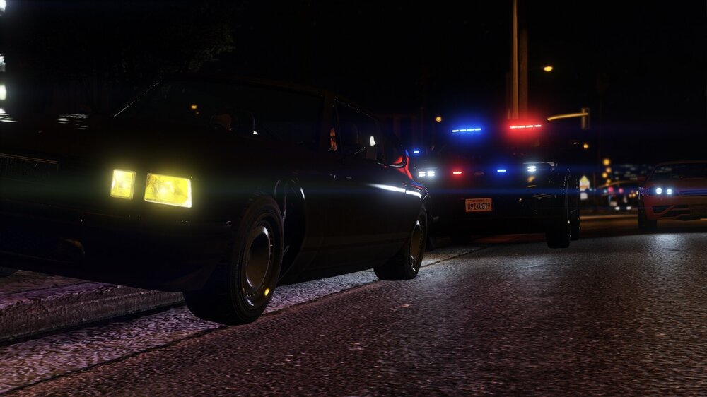 Could contain: outdoor, land vehicle, sky, light, ground, wheel, road, night, automotive lighting, street, dark, parked, car, vehicle