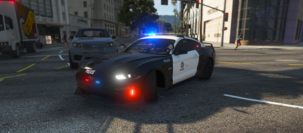 Could contain: vehicle, land vehicle, outdoor, wheel, road, transport, tire, auto part, building, automotive lighting, automotive design, street, light, ground, car, police