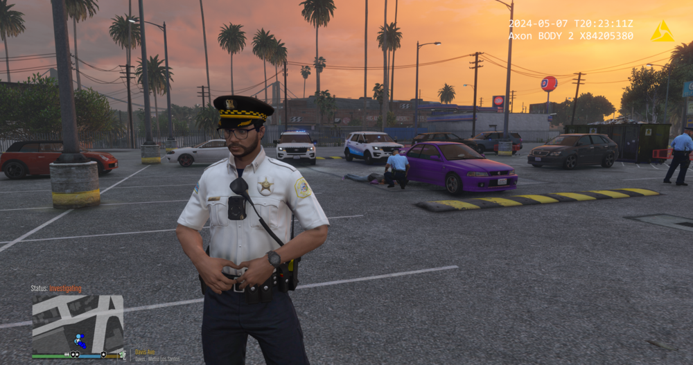 Could contain: clothing, person, sky, outdoor, car, land vehicle, vehicle, man, road, wheel, tree, ground, street