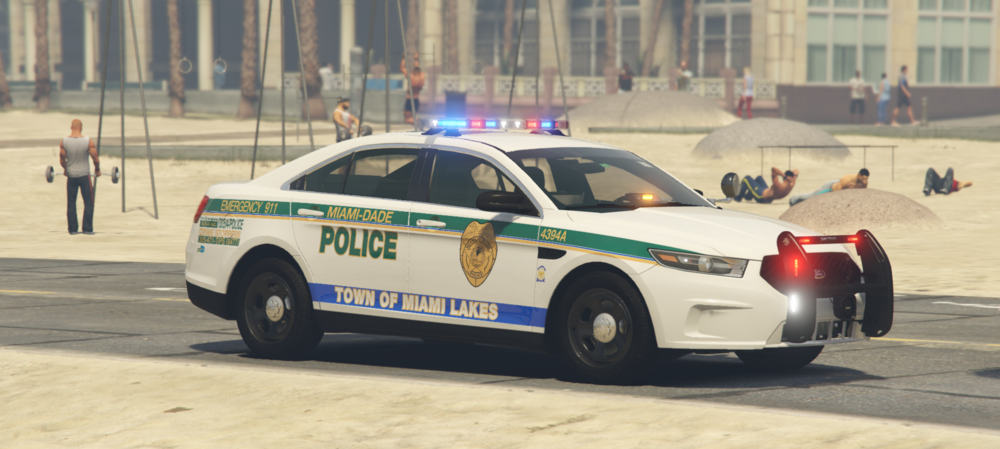 Could contain: vehicle, land vehicle, wheel, transport, outdoor, police car, law enforcement, police, full-size car, text, emergency service, emergency vehicle, car, street