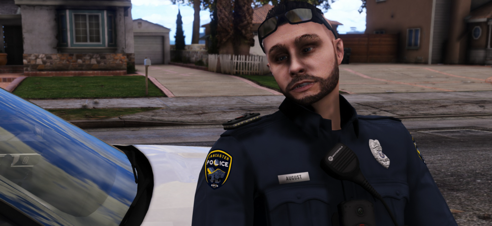 Could contain: human face, clothing, outdoor, person, man, vehicle, car, land vehicle