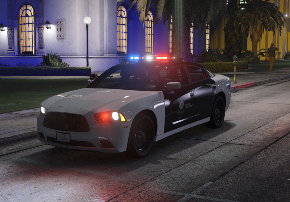 Could contain: land vehicle, vehicle, wheel, outdoor, road, automotive design, luxury vehicle, automotive lighting, tire, building, auto part, street, ground, light, car, red, night