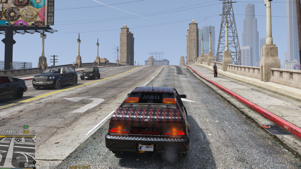 Could contain: outdoor, sky, land vehicle, vehicle, text, wheel, ground, road, building, car, truck, track, billboard, street, city