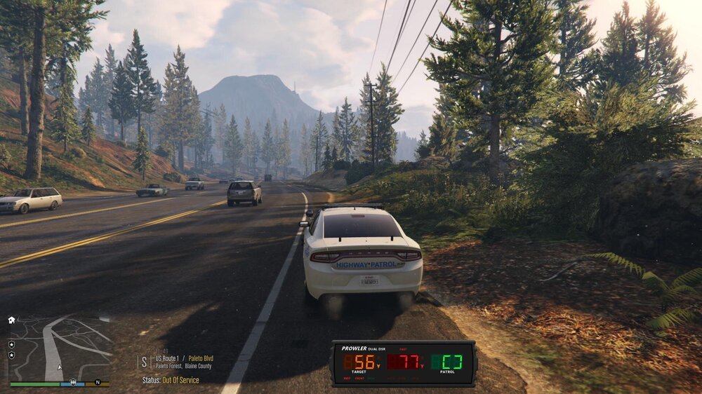 Could contain: outdoor, vehicle, text, land vehicle, road, sky, tree, cloud, car, wheel, thoroughfare, vehicle registration plate, freeway, lane, asphalt, highway, mountain, way, street, driving