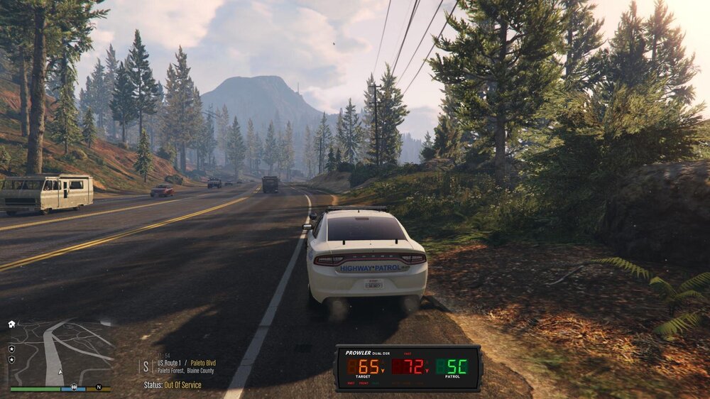 Could contain: outdoor, vehicle, text, land vehicle, road, sky, tree, cloud, wheel, car, thoroughfare, highway, mountain, street