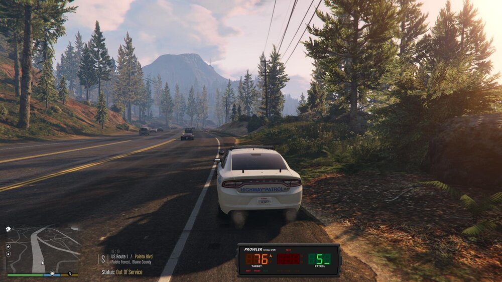 Could contain: vehicle, outdoor, land vehicle, text, sky, road, tree, wheel, tire, cloud, screenshot, mountain, highway, car, ground