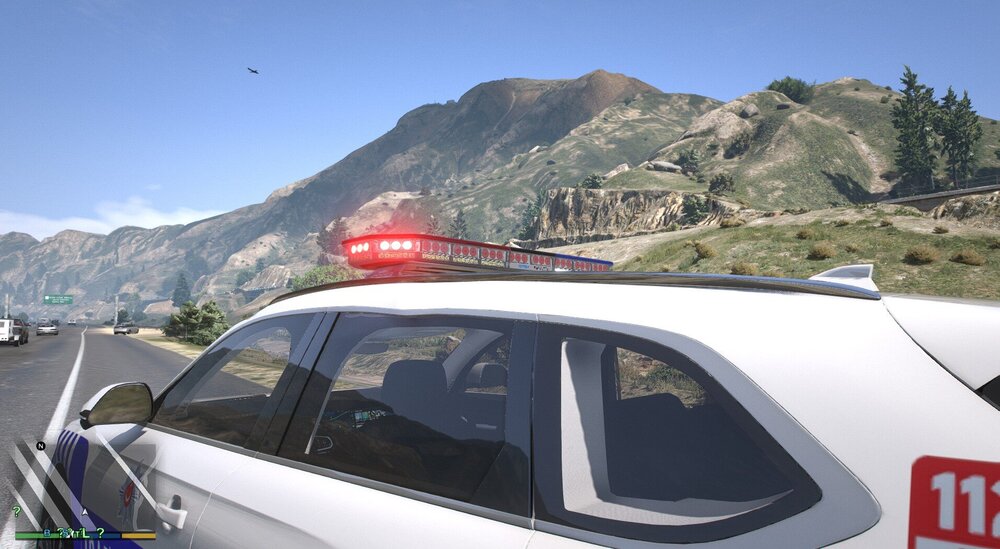 Could contain: outdoor, vehicle, sky, land vehicle, mountain, transport, windshield, vehicle door, car, parked