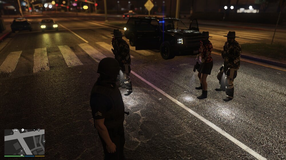 Could contain: vehicle, car, land vehicle, road, pc game, street, person, outdoor, ground, night