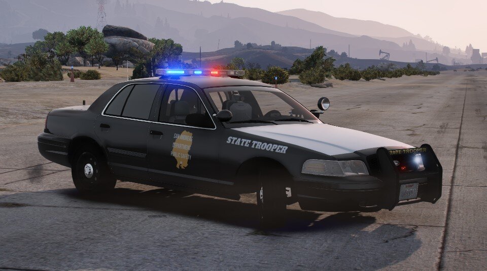 Could contain: vehicle, land vehicle, outdoor, wheel, transport, tire, ford crown victoria police interceptor, law enforcement, car, police car, full-size car, police, auto part, sedan, road, ground