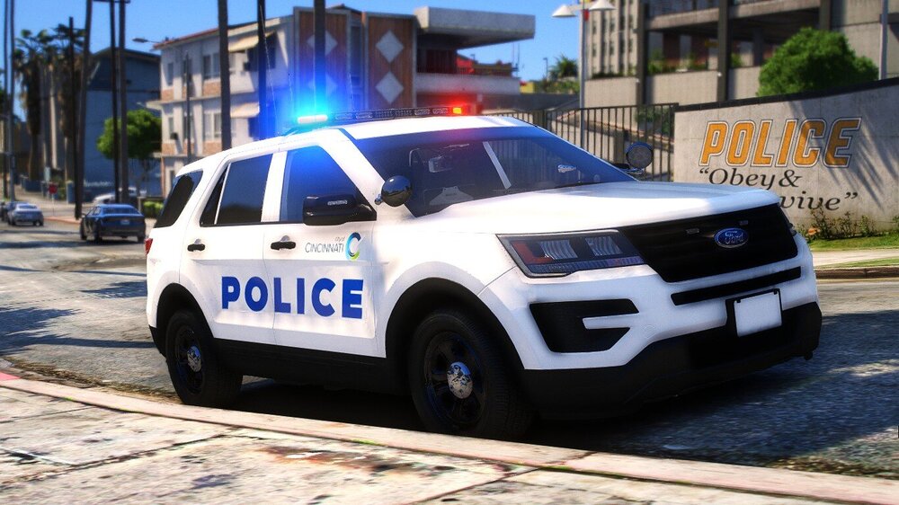 Could contain: vehicle, land vehicle, wheel, outdoor, police car, tire, text, law enforcement, auto part, transport, ford, bumper, vehicle registration plate, sport utility vehicle, emergency service, ford motor company, emergency vehicle, full-size car, compact sport utility vehicle, police van, car, van, street, police