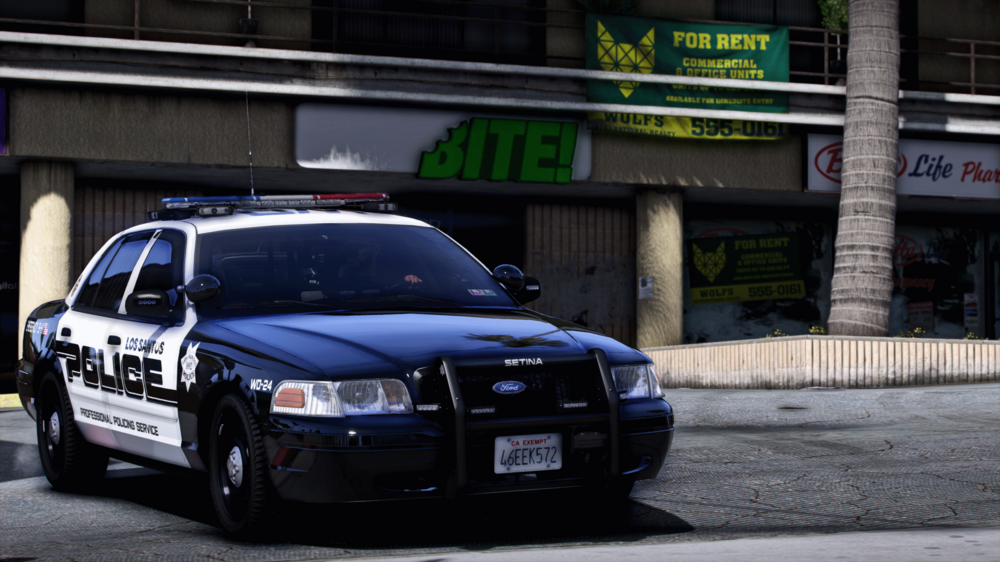 Could contain: vehicle, land vehicle, text, wheel, law enforcement, police car, full-size car, transport, outdoor, vehicle registration plate, tire, auto part, ford crown victoria police interceptor, mid-size car, emergency service, ford, road, street, police, car