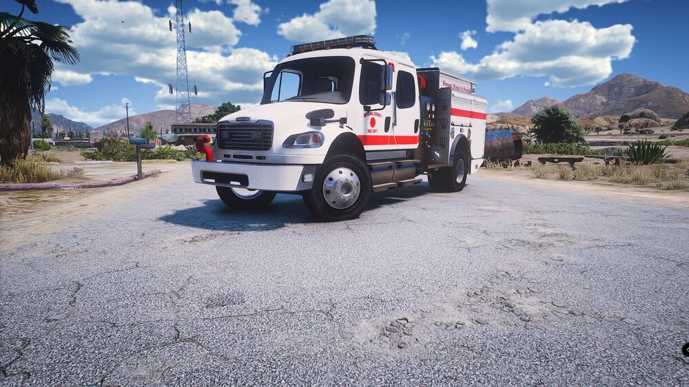 Could contain: sky, outdoor, vehicle, wheel, land vehicle, transport, cloud, tire, auto part, road, tree, motor vehicle, truck, ground, mountain, parked