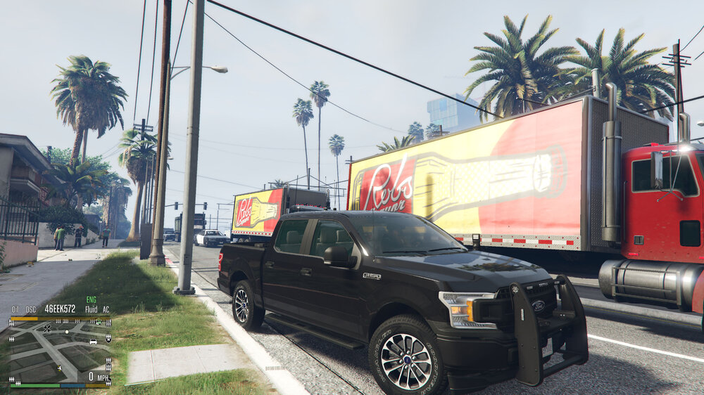 Could contain: outdoor, sky, land vehicle, wheel, vehicle, tire, transport, truck, auto part, tree, road, text, car, street, ground, parked