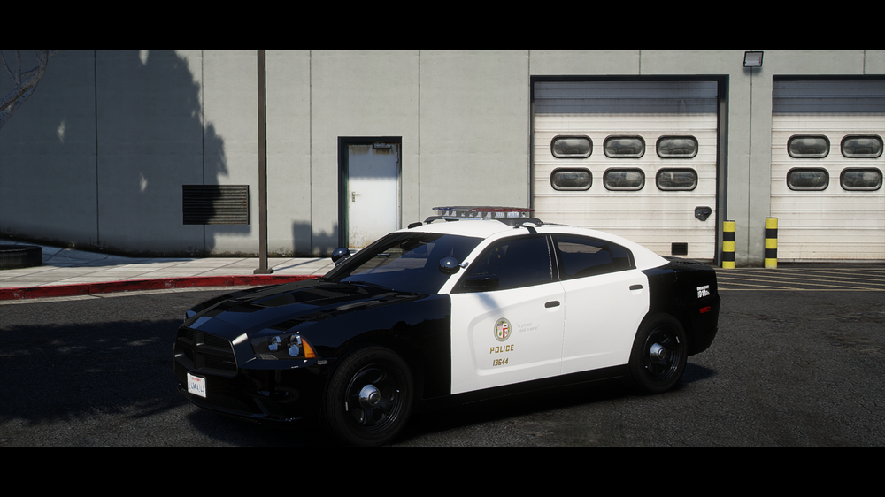 Could contain: vehicle, land vehicle, wheel, tire, outdoor, car, transport, automotive design, building, police, alloy wheel, bumper, road, auto part, mid-size car, luxury vehicle, street