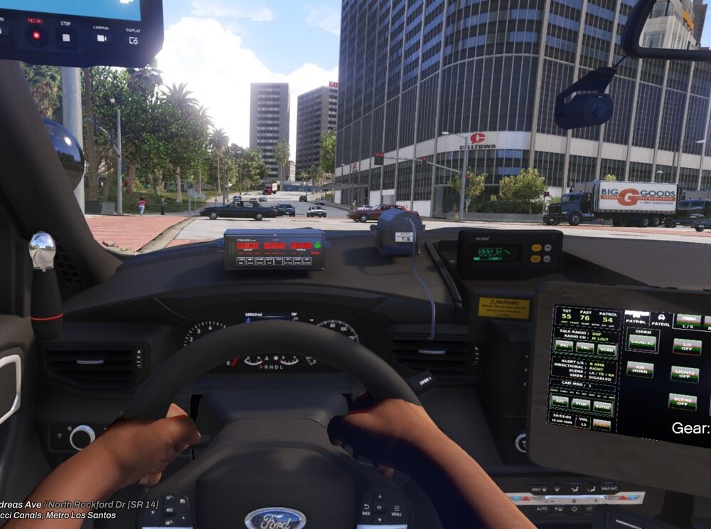 Could contain: text, vehicle, land vehicle, sky, outdoor, person, car, windshield, city, cockpit, control panel