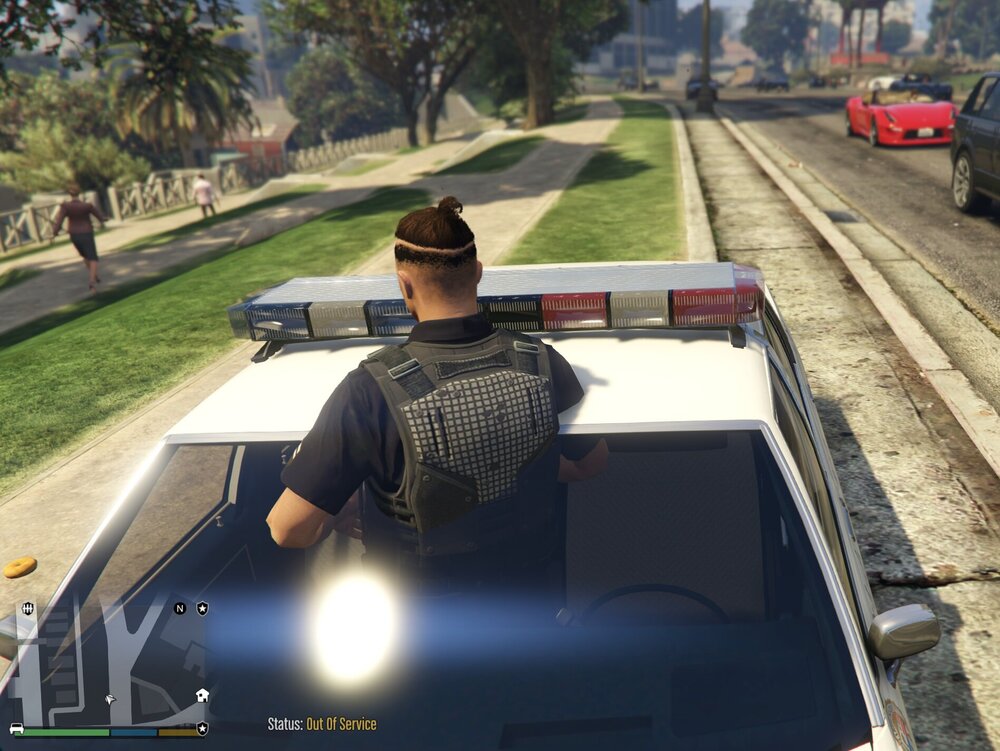 Could contain: land vehicle, outdoor, vehicle, tree, person, clothing, car, grass, track, train