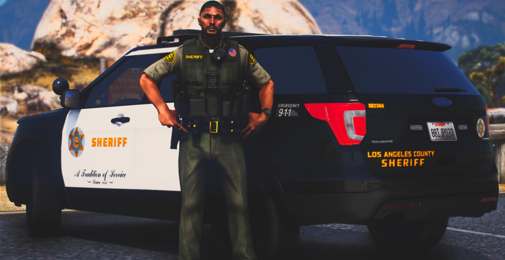 Could contain: vehicle, land vehicle, outdoor, tire, wheel, car, text, auto part, clothing, automotive exterior, person, law enforcement, motor vehicle, automotive tail & brake light, vehicle registration plate, sport utility vehicle, automotive luggage rack, police, transport, mountain