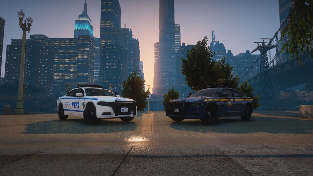 Could contain: vehicle, land vehicle, outdoor, wheel, sky, transport, car, skyscraper, text, automotive design, sports car, tire, road, city, police, ground, street