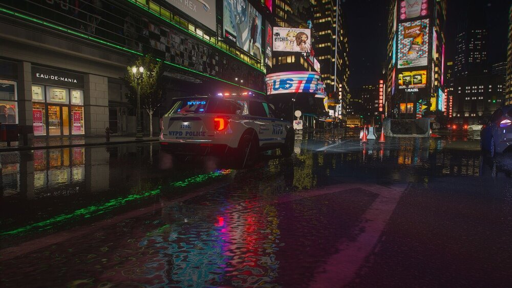 Could contain: building, vehicle, land vehicle, outdoor, text, street, night, car, electricity, electronic signage, billboard, skyscraper, city, road, light