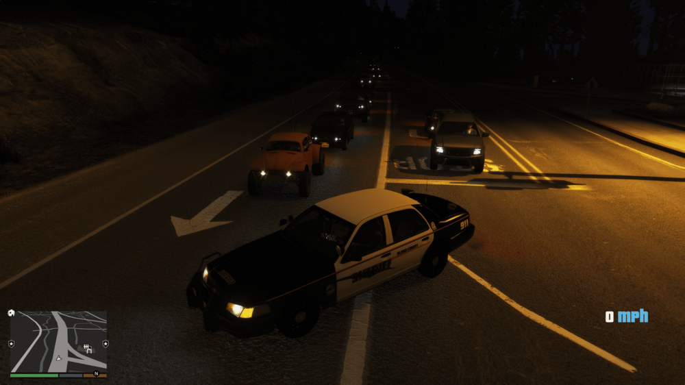 Could contain: vehicle, land vehicle, wheel, road, screenshot, outdoor, car, way, street, night