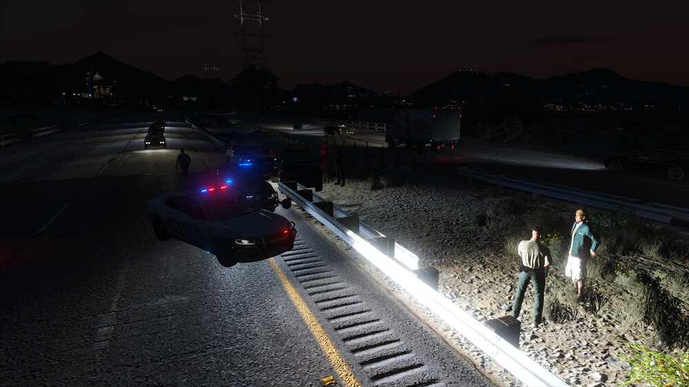 Could contain: outdoor, ground, sky, road, vehicle, light, way, land vehicle, track, night, street, people