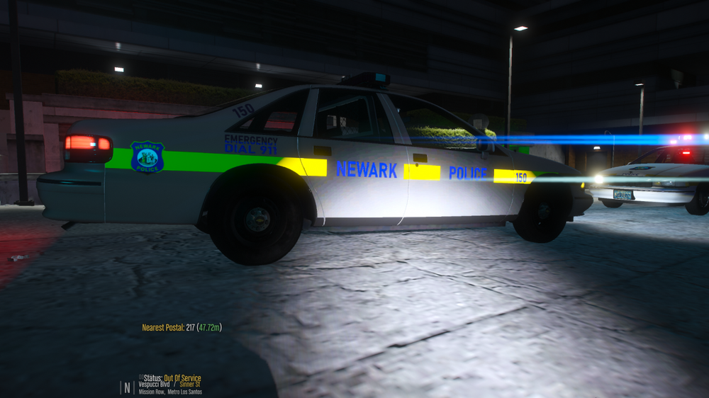 Could contain: vehicle, land vehicle, wheel, tire, transport, road, police car, emergency service, law enforcement, full-size car, emergency vehicle, police, ford crown victoria police interceptor, car, outdoor, ground, parked, light, street