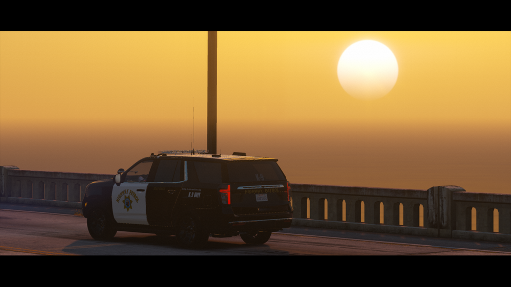 Could contain: vehicle, outdoor, land vehicle, sky, wheel, tire, car, sunset, sunrise, ground, driving