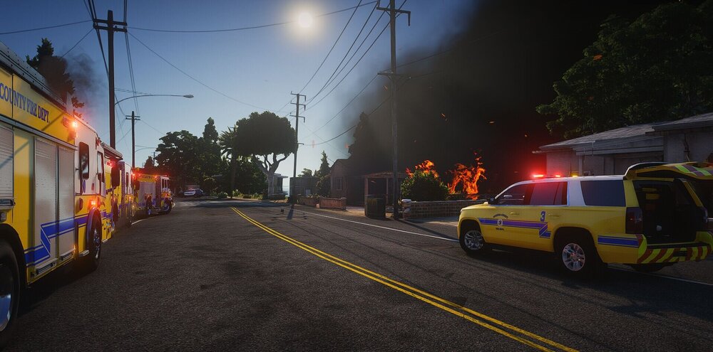 Could contain: outdoor, sky, vehicle, land vehicle, road, firefighter, transport, emergency service, electricity, tree, emergency vehicle, emergency, public utility, wheel, street, mode of transport, yellow, ambulance, fire, light, night, ground, city