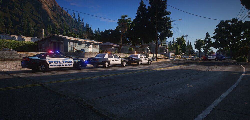 Could contain: outdoor, vehicle, land vehicle, road, sky, wheel, tree, asphalt, car, tire, street, ground, mountain