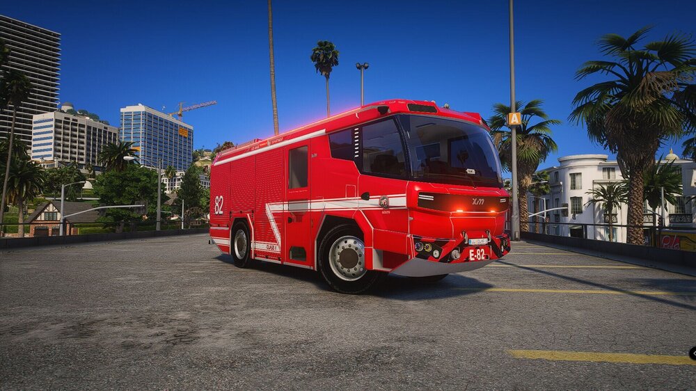 Could contain: outdoor, vehicle, transport, land vehicle, sky, road, wheel, red, tree, bus, mode of transport, building, emergency vehicle, city, parked, street, truck