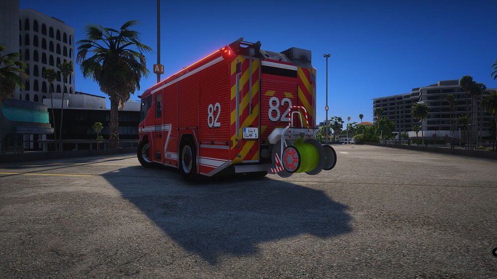 Could contain: outdoor, sky, transport, vehicle, wheel, land vehicle, truck, tree, road, ground, road surface, large, parked, red