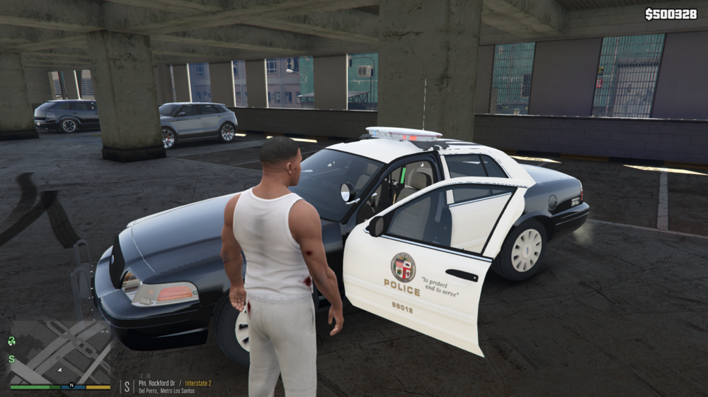 Could contain: vehicle, land vehicle, wheel, tire, car, transport, clothing, vehicle door, person, outdoor, ground