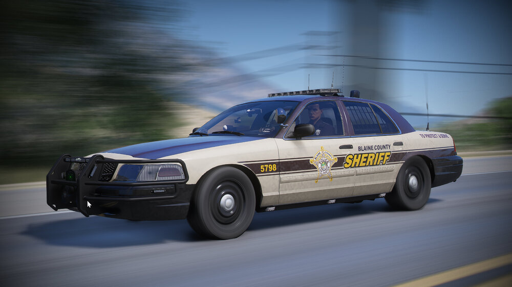 Could contain: vehicle, land vehicle, wheel, car, transport, tire, outdoor, full-size car, police, sedan, police car, road, law enforcement, auto part, mid-size car