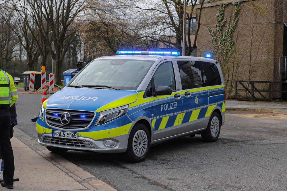 Could contain: vehicle, land vehicle, outdoor, transport, wheel, emergency service, emergency vehicle, police, law enforcement, car, emergency, police van, police car, text, ford, van, street