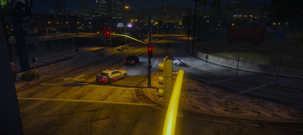 Could contain: outdoor, vehicle, ground, car, yellow, night, light, street