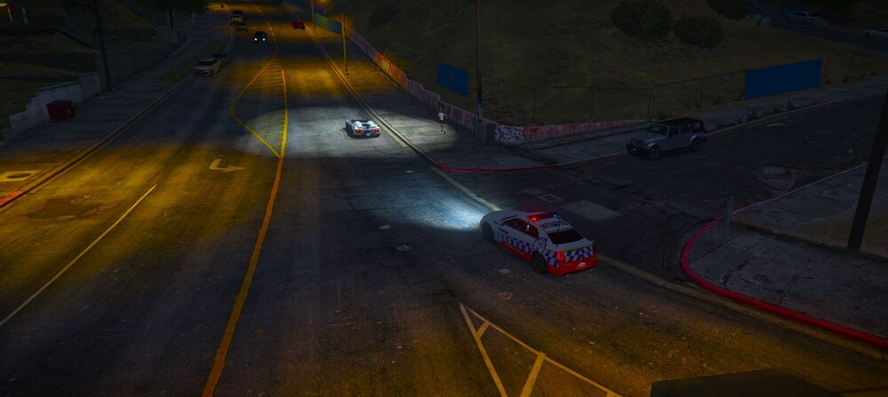 Could contain: vehicle, car, road, way, land vehicle, screenshot, road surface, asphalt, intersection, highway, street, outdoor, night